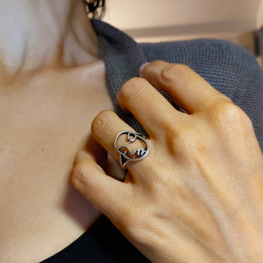 Silver abstract face ring, modern mask sculptural statement piece