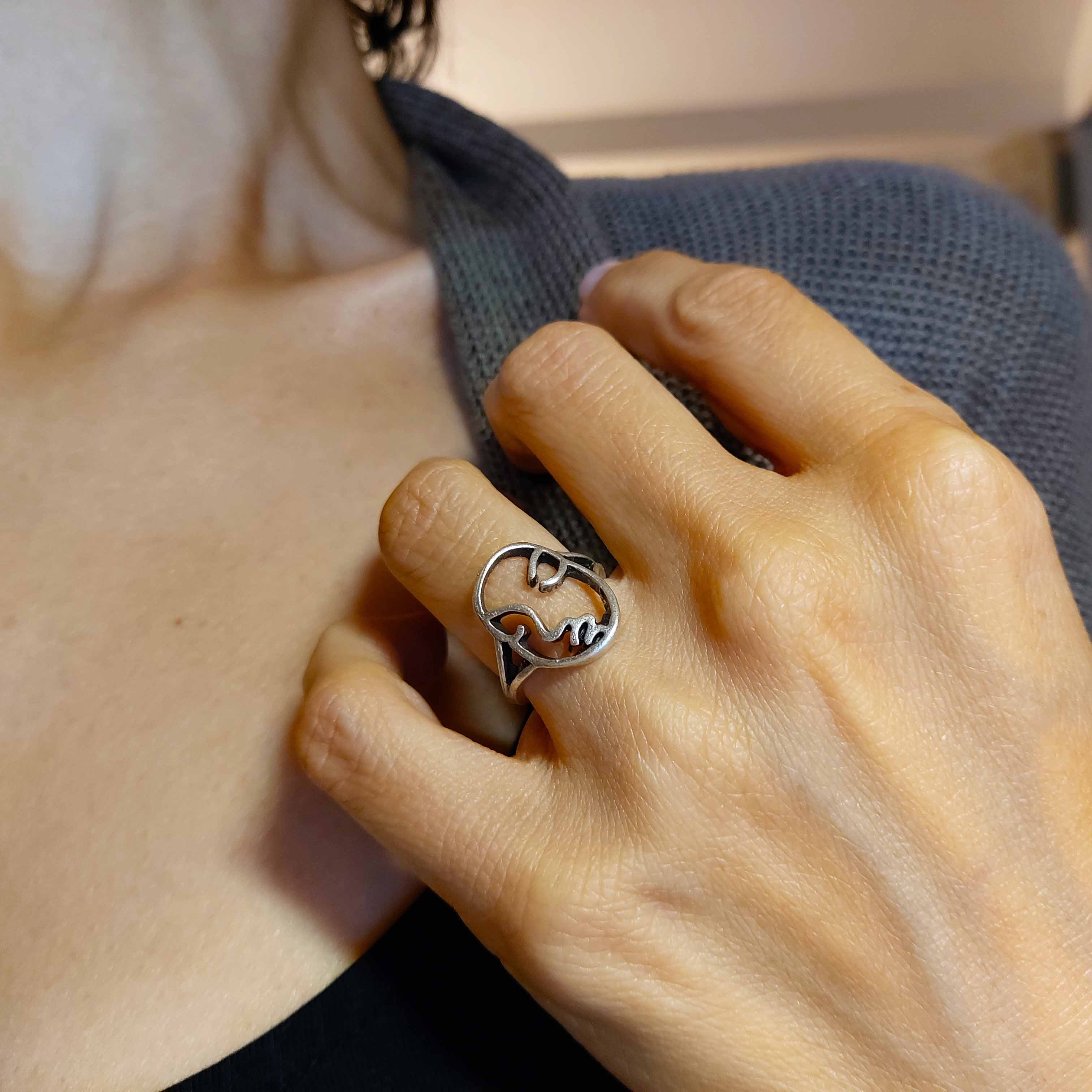 Silver abstract face ring, modern mask sculptural statement piece