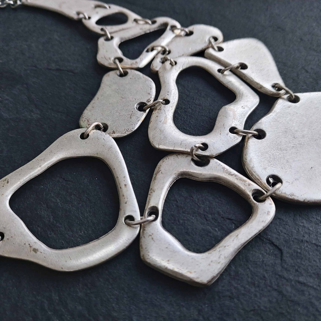 Silver brutalist mosaic bib necklace, organic geometric statement jewellery