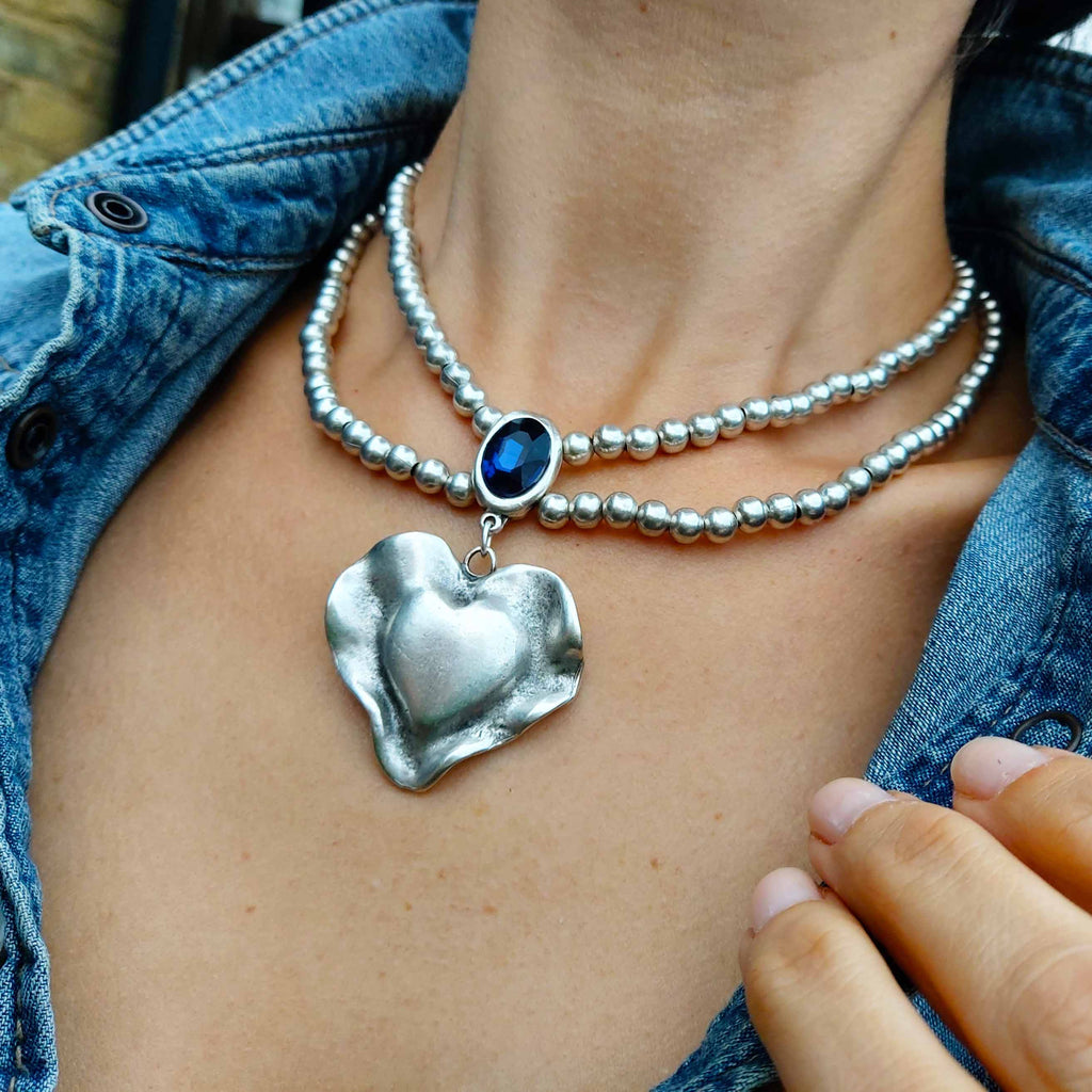 Silver molten heart pendant necklace, double strand bead chain with blue stone