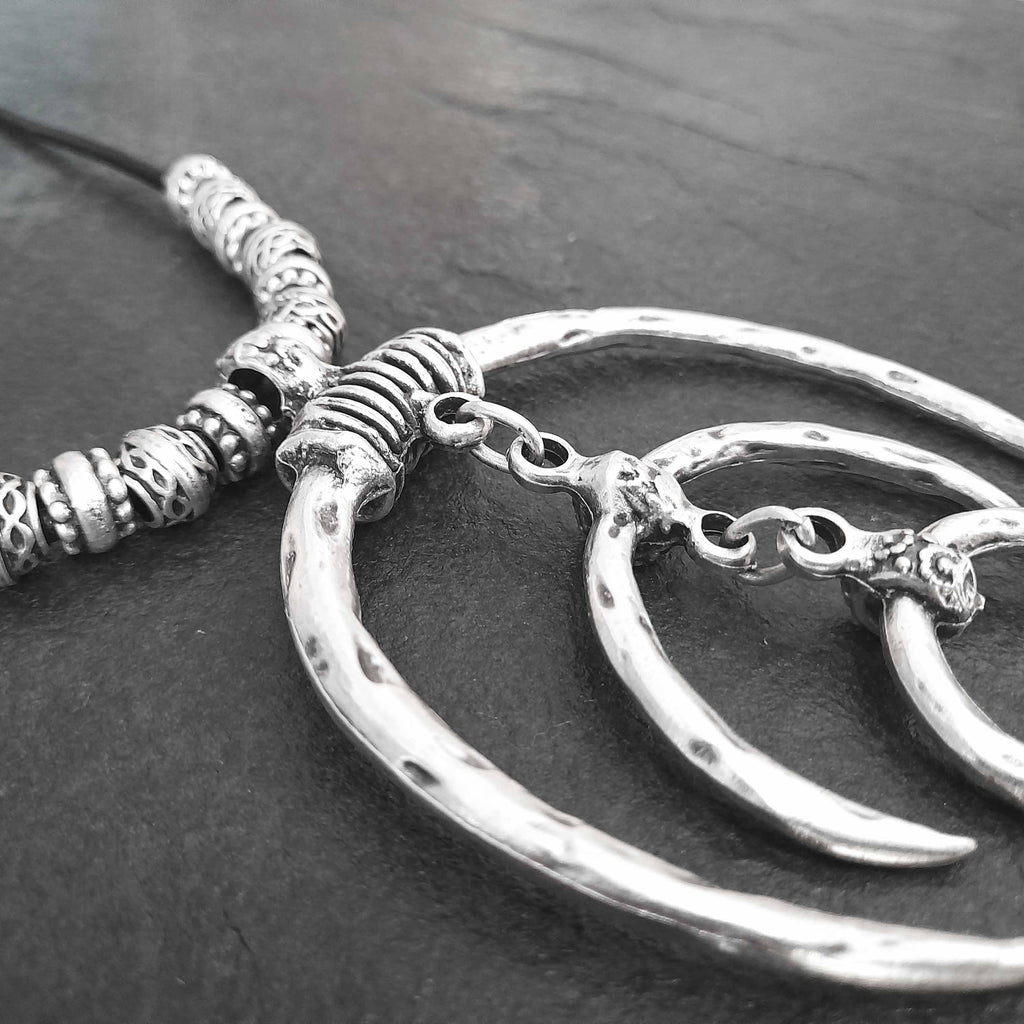 Tuareg double crescent necklace, silver plated african statement, leather cord