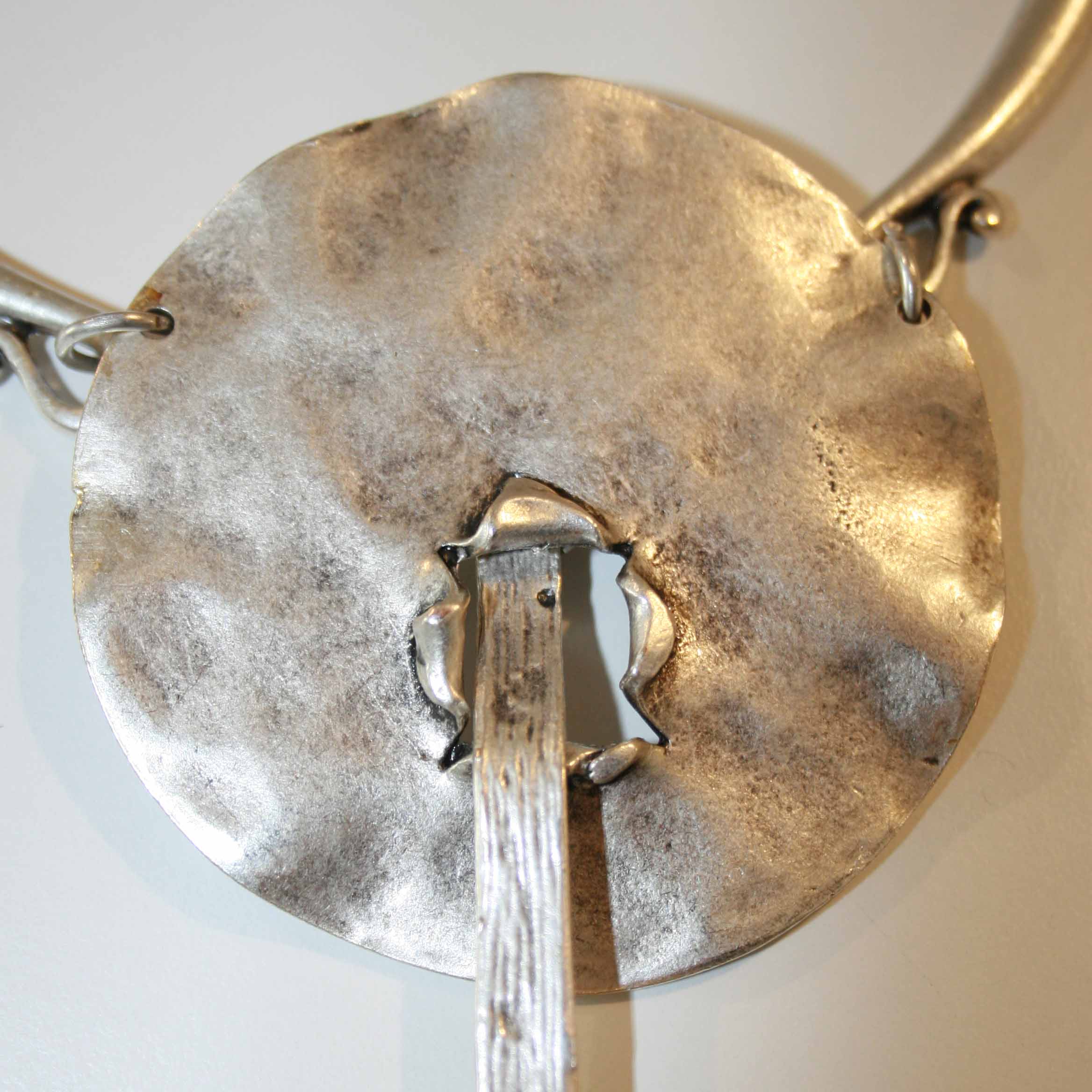 Silver brutalist geometric necklace, hammered disc pendant sculptural statement