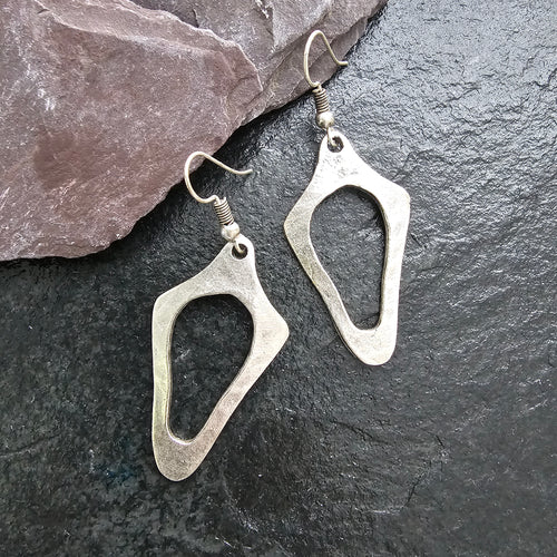 Brutalist silver earrings, anatomical sculptural drop statement
