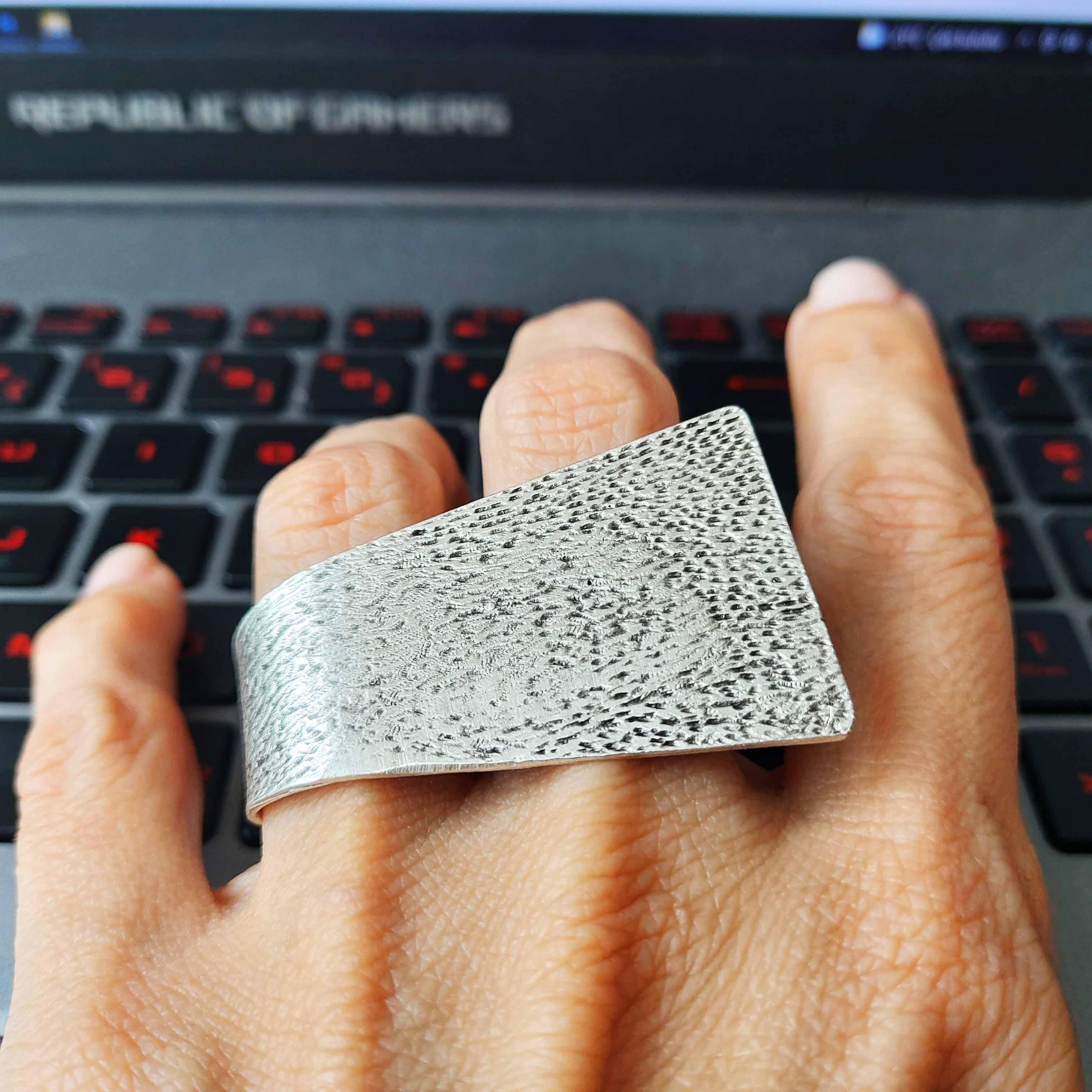 Wide hammered silver ring, brutalist geometric chunky textured statement band