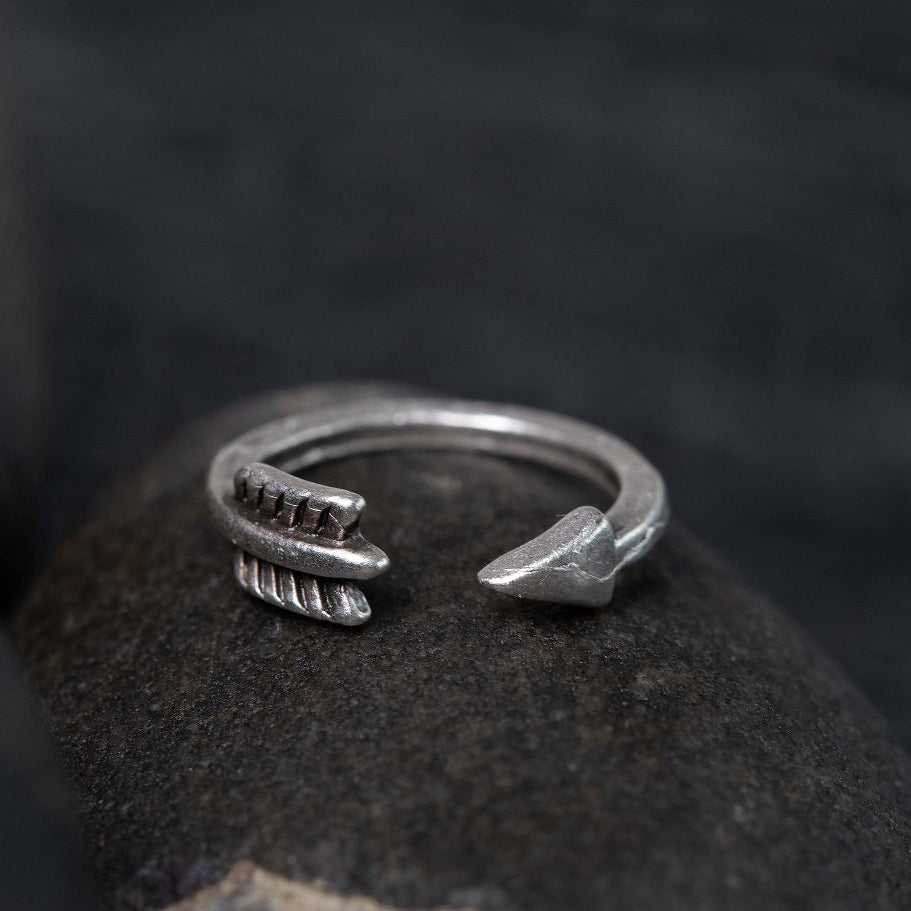 Boho silver arrow ring on hand, adjustable tribal minimalist stackable midi