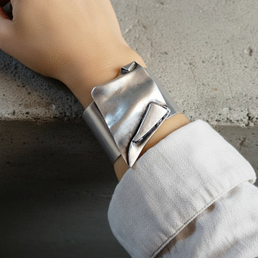 Brutalist wide asymmetrical sculptural silver statement cuff bangle
