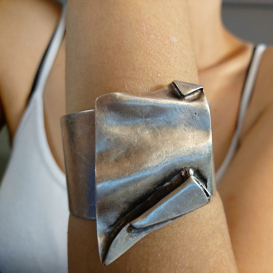 Brutalist chunky wide folded silver sculptural statement cuff bracelet