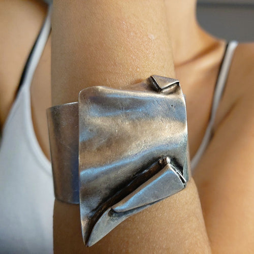 Brutalist wide asymmetrical sculptural silver statement cuff bangle