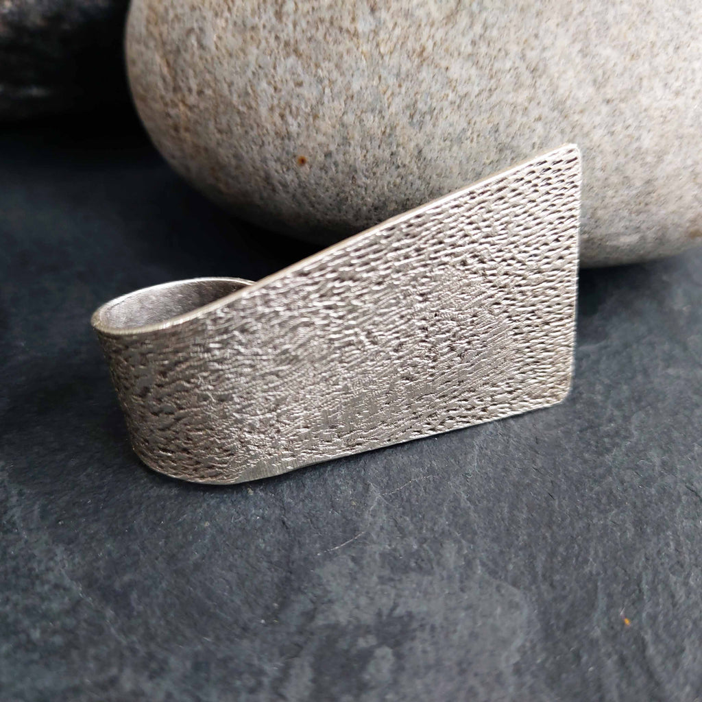 Wide hammered silver ring, brutalist geometric chunky textured statement band