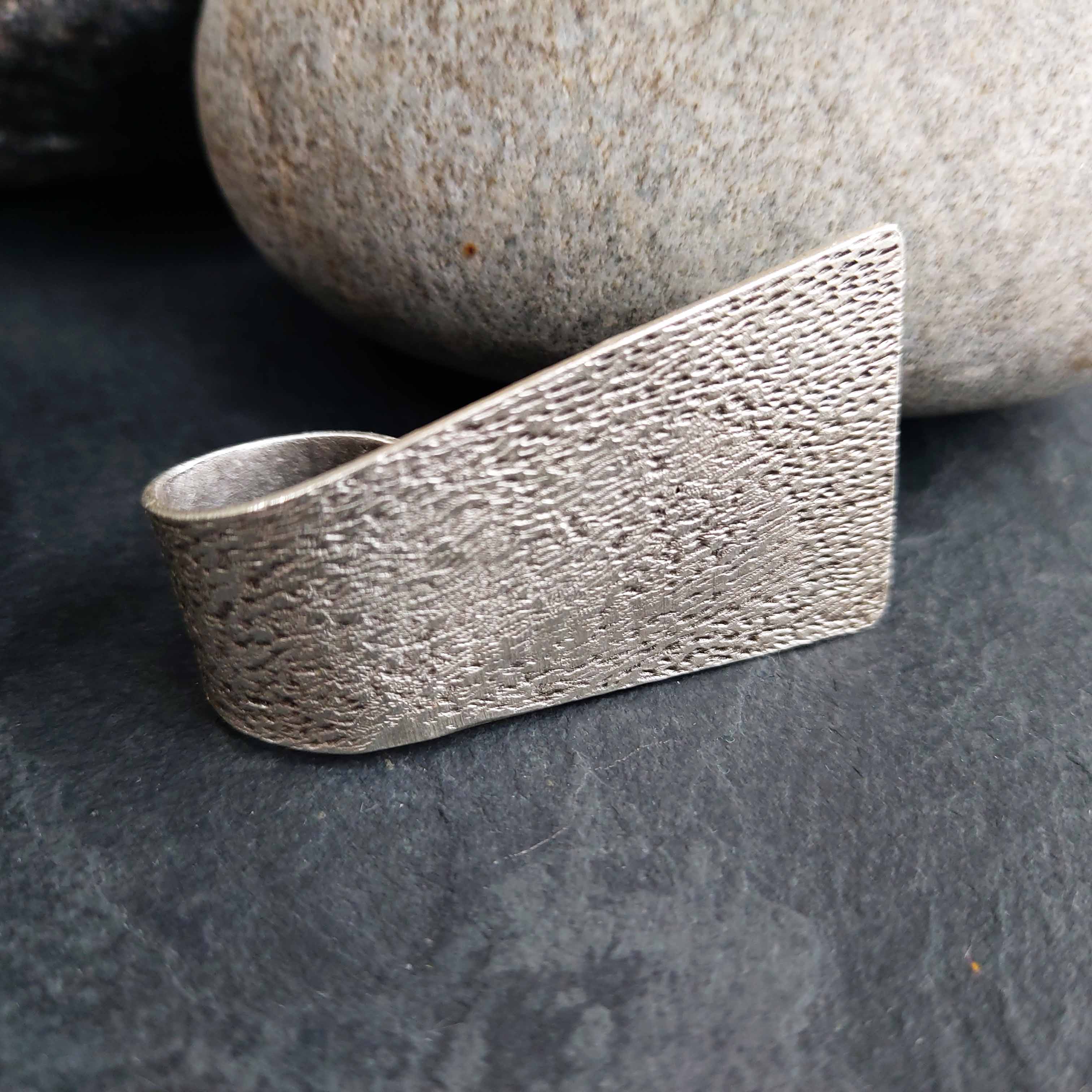 Wide hammered silver ring, brutalist geometric chunky textured statement band