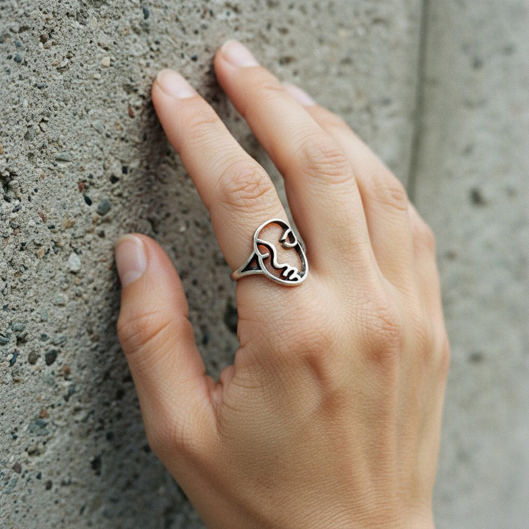 Silver abstract face ring, modern mask sculptural statement piece