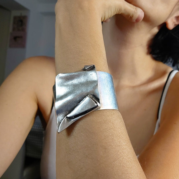 Brutalist wide asymmetrical sculptural silver statement cuff bangle