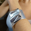 Brutalist chunky wide folded silver sculptural statement cuff bracelet