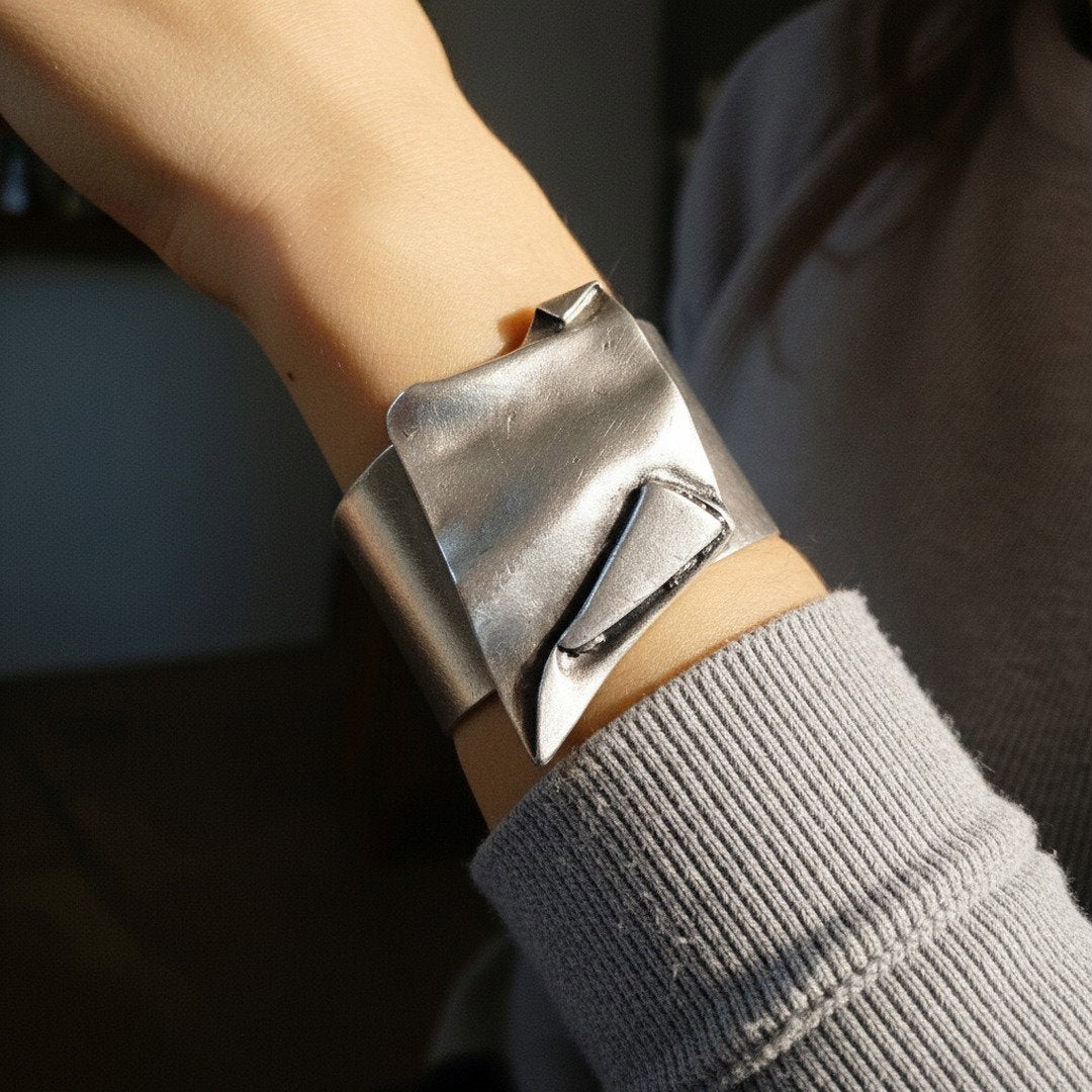 Brutalist chunky wide folded silver sculptural statement cuff bracelet
