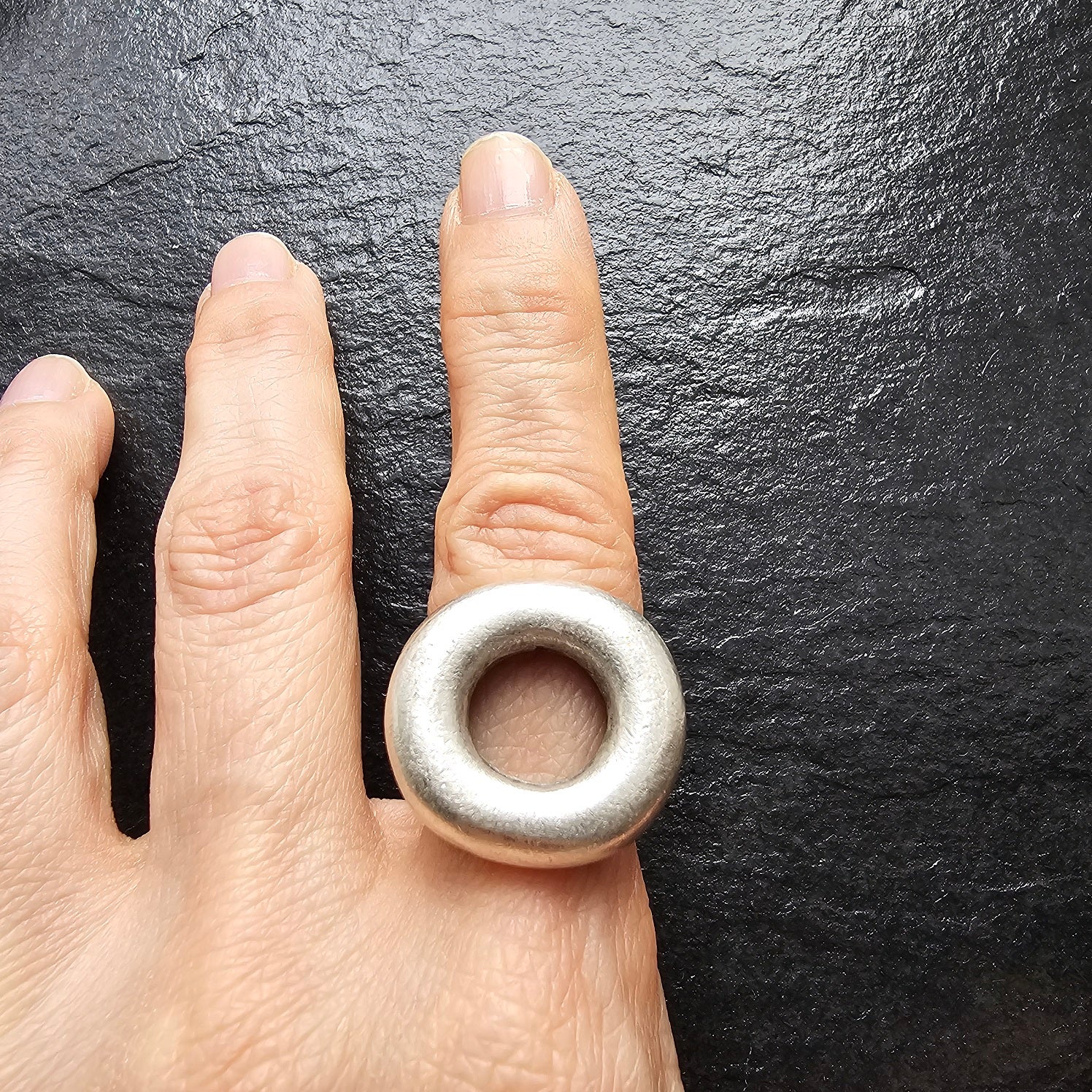 Chunky circle ring, bold geometric open minimalist brutalist statement ring
