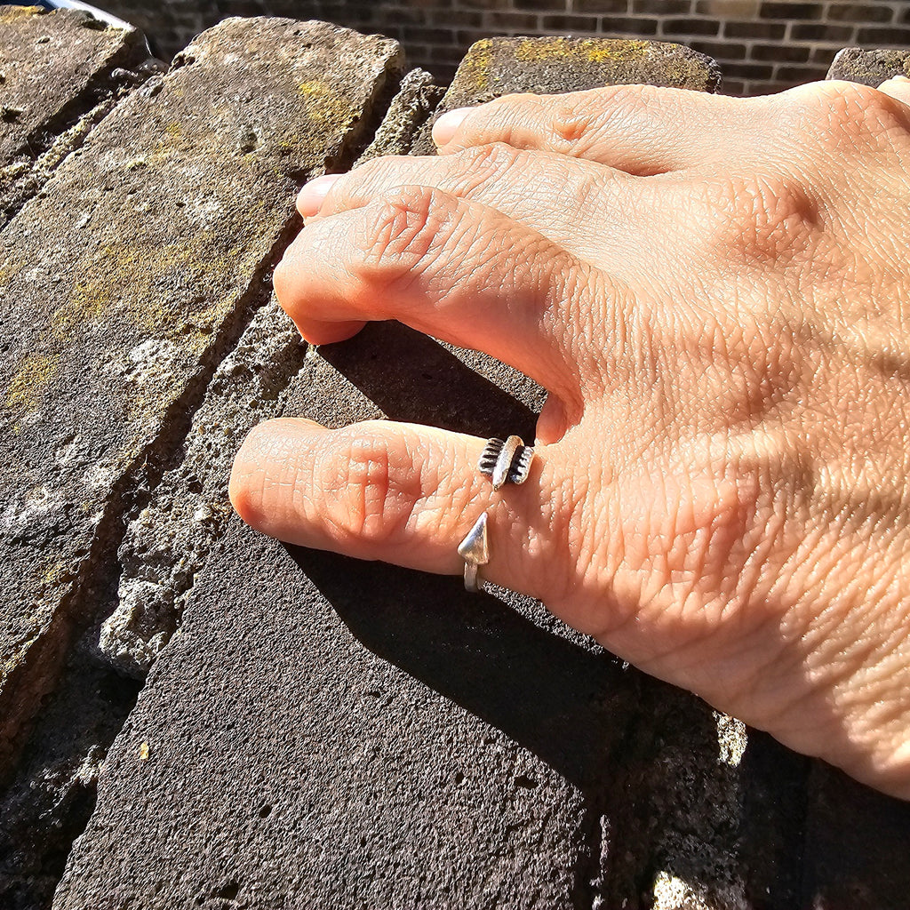 Modernist silver arrow ring, rectangular top symbol adjustable statement