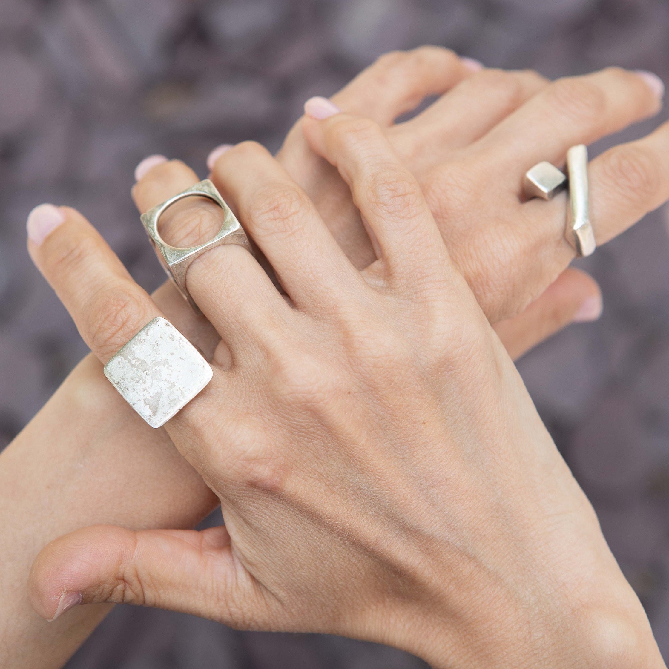 Chunky square silver ring, brutalist minimalist statement design close-up