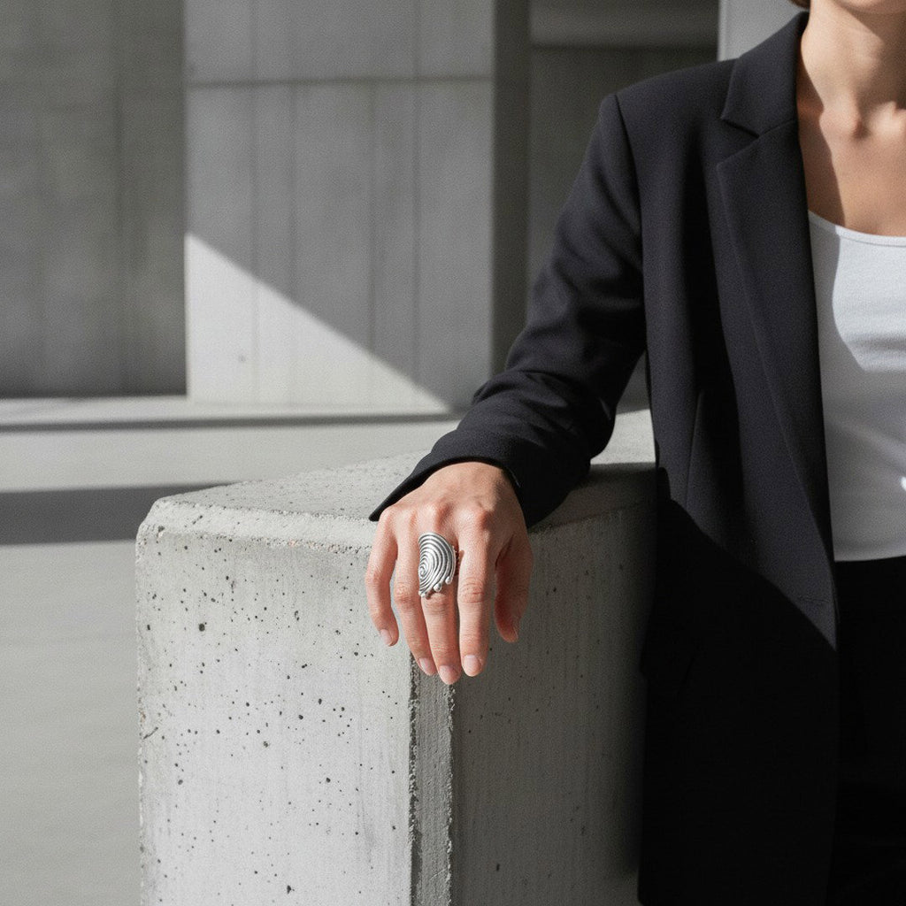 Spiral disc statement ring, sculptural silver concentric swirl design