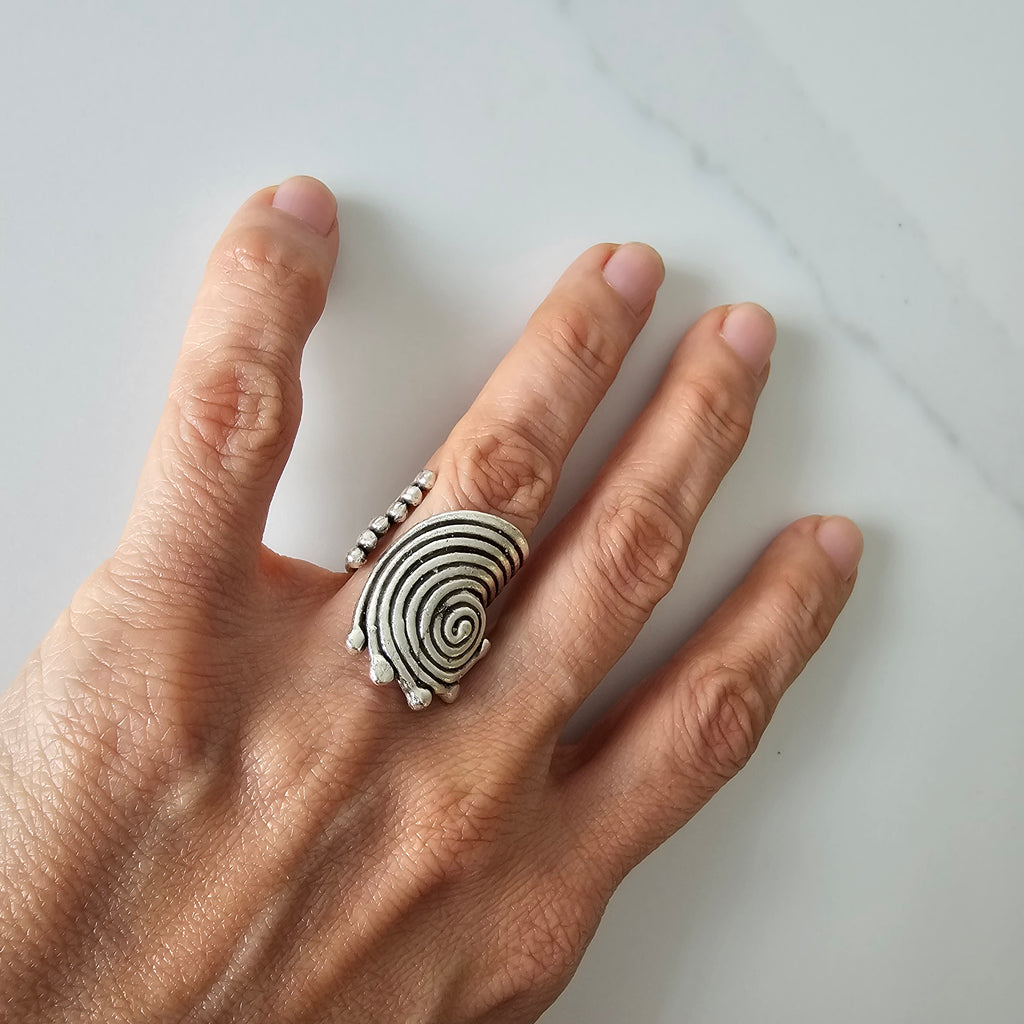 Spiral disc statement ring, sculptural silver concentric swirl design