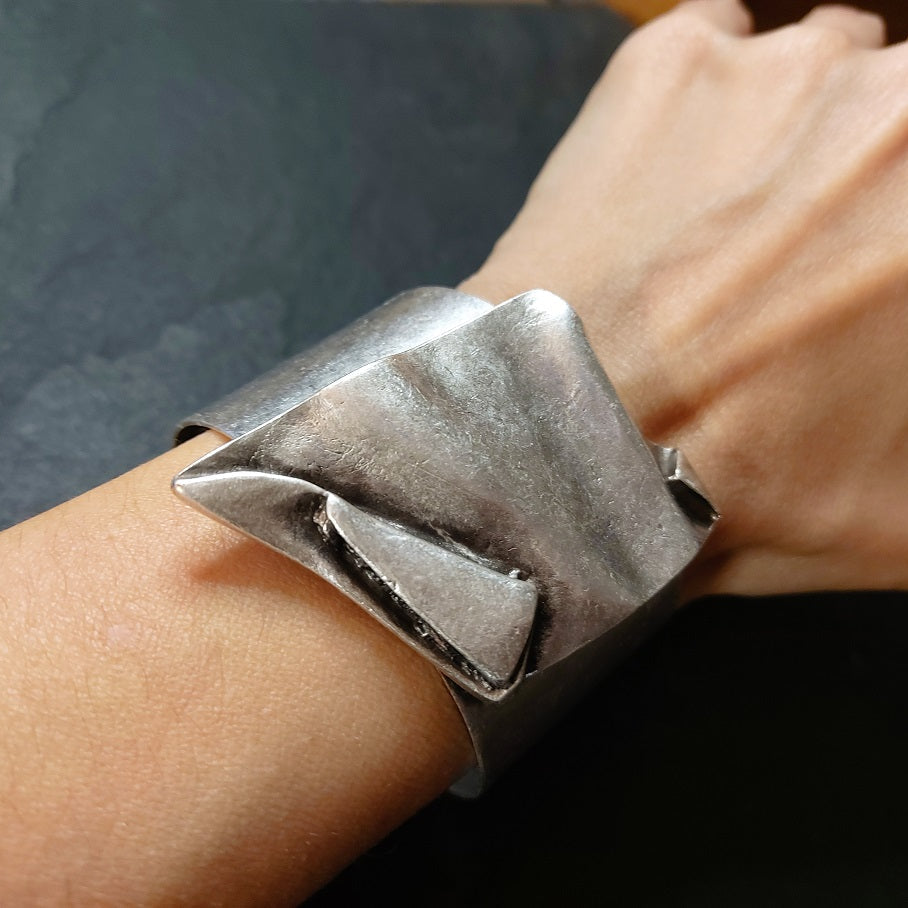 Brutalist wide asymmetrical sculptural silver statement cuff bangle