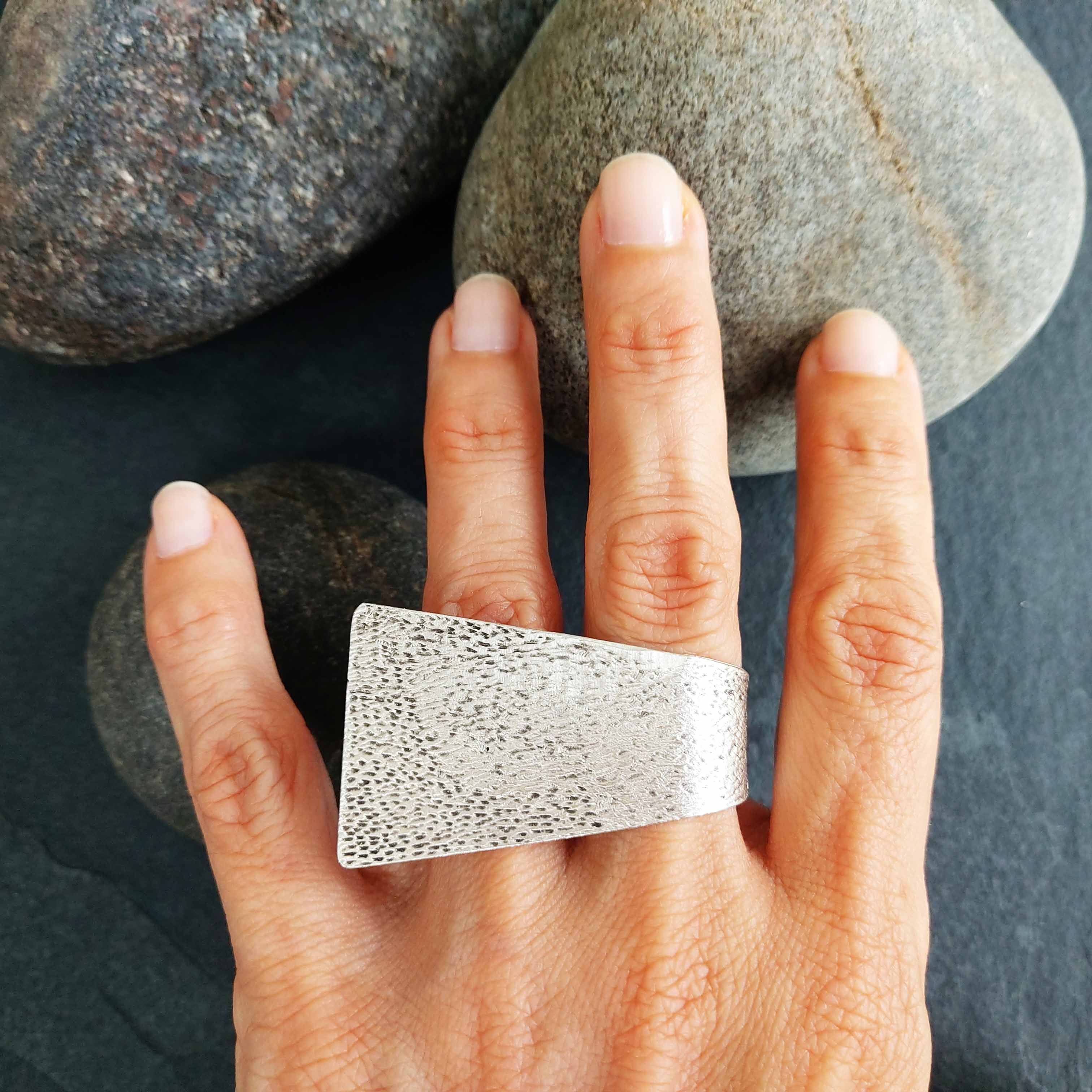 Wide hammered silver ring, brutalist geometric chunky textured statement band